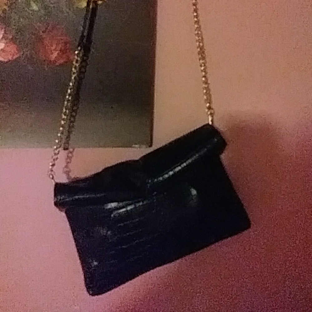 Bocket book/ clutch man made material